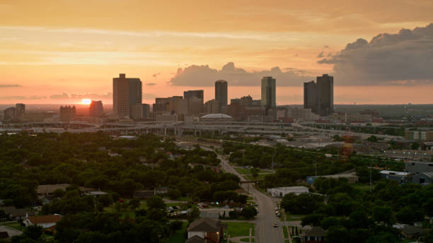 istock Drone Shot of Fort Worth with Sun Setting Behind Downtown Skyline 1372638607