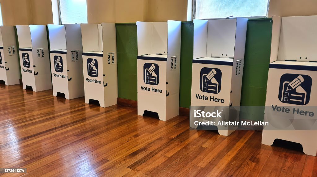 A Row of Voting Booths Ready for Election Day A Row of Voting Booths Ready for Election Day in Australia Election Stock Photo