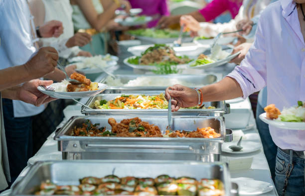 istock scooping the food, catering, dinner time 1372647490