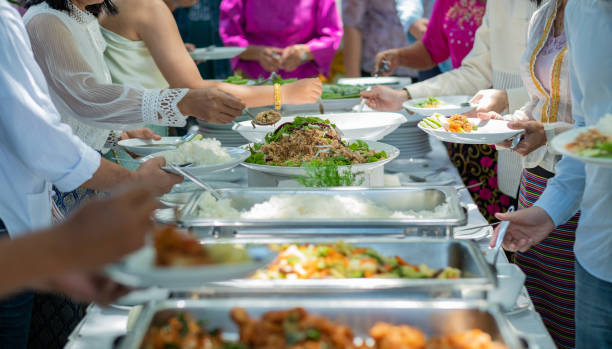 istock scooping the food, catering, dinner time 1372647502