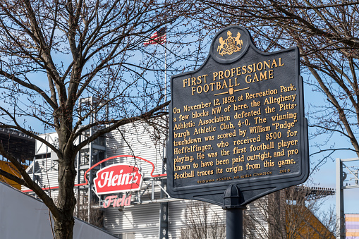 Pittsburgh, Pennsylvania, USA February 24, 2022 A historic sign, located in front Heinz Feild for the first professional football game ever played in 1892 on the north side of the city