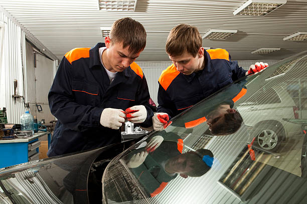 istock Two Real Mechanics working  in Auto Repair Shop. 137265117