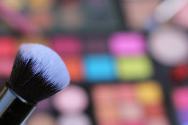 Brightly Colored Cosmetic Pigment Palettes and Cosmetic Brushes