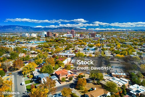 istock Albuquerque Skyline With Neighborhoods And Mountains 1372658426