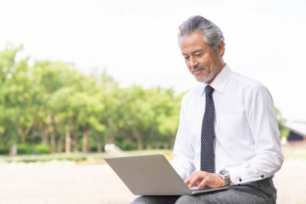 istock asian businessman using laptop 1372659085