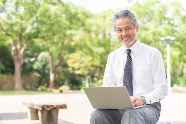 istock asian businessman using laptop 1372659110