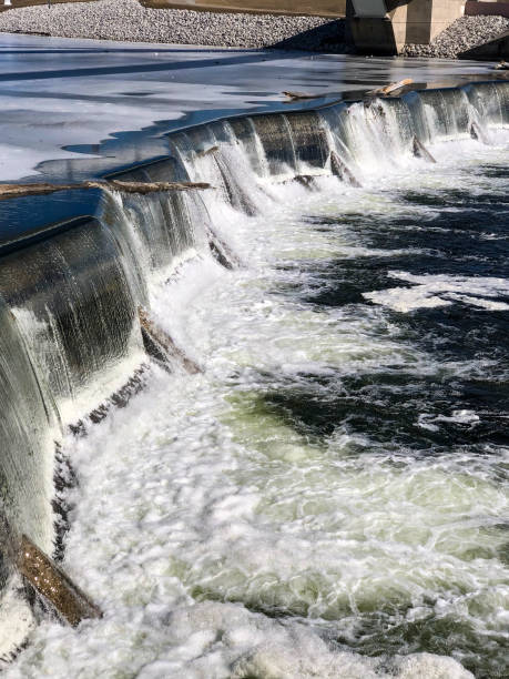 istock Beautiful small waterfalls under bridge in Iowa 1372662419