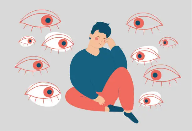 Vector illustration of Young man surrounded by big evil eyes feels helpless. Depressed boy suffers from psychological problems looks overwhelmed. Vector stock
