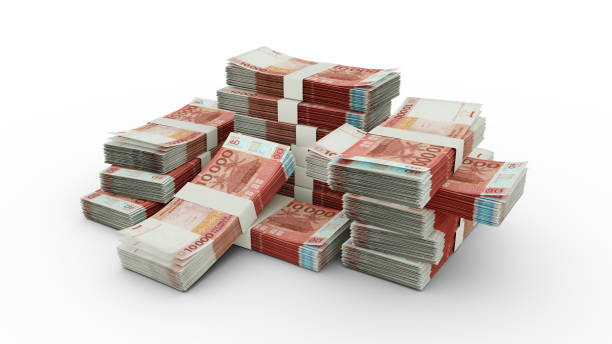 istock Stack of CFP franc notes. 3D rendering of bundles of banknotes 1372665322