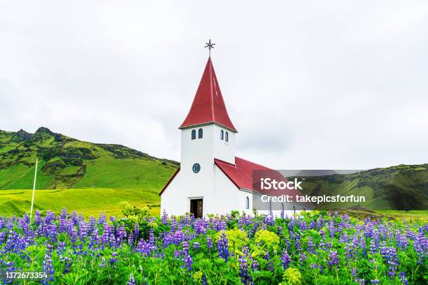 View Of Reyniskirkja Church On The Top Of Mountain Stock Photo - Download Image Now