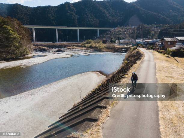 Country Side Bike Ride Aerial View Stock Photo - Download Image Now - Japan, Non-Urban Scene, 40-44 Years