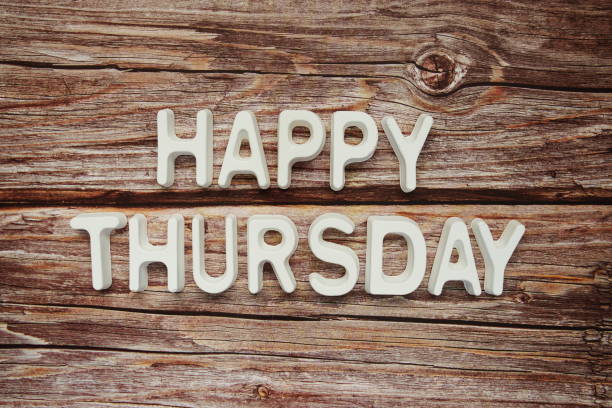 istock Happy Thursday text message on wooden background 1372692899