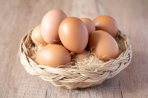 istock fresh chicken eggs in a wicker basket 1372698423