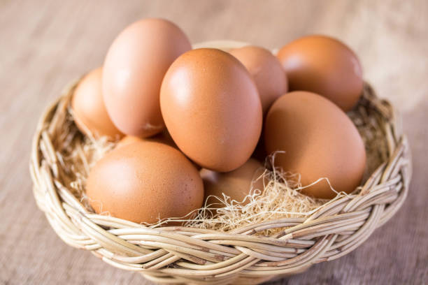 istock fresh chicken eggs in a wicker basket 1372698575