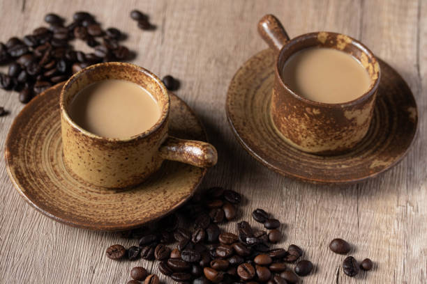 istock hot coffee in brown cup on wooden background 1372698660