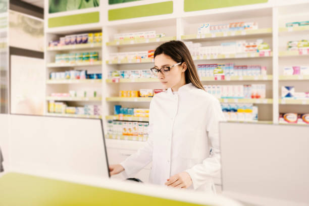 istock A female pharmacist working on computer in pharmacy. 1372700394