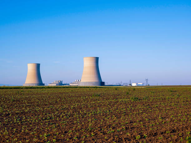istock Thermal power plant chimneys 1372701228