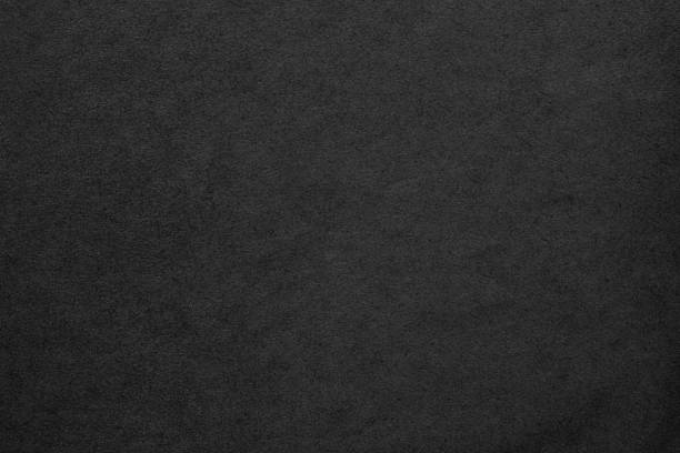 istock black background, paper texture similar to concrete wall 1372703438