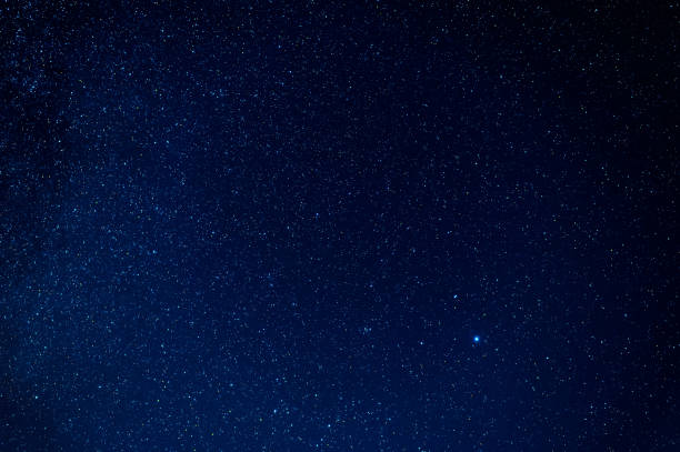 istock Night starry sky with stars, constellations, nebulae and galaxies at night. Abstract blue background 1372704843