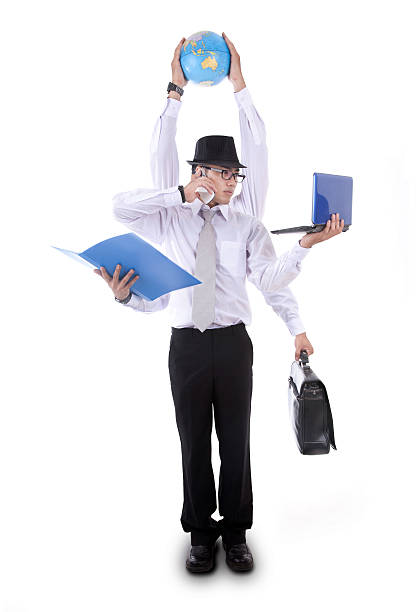 Asian businessman with six arms juggling work