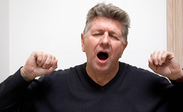 istock Man in his fifties yawning 137270973