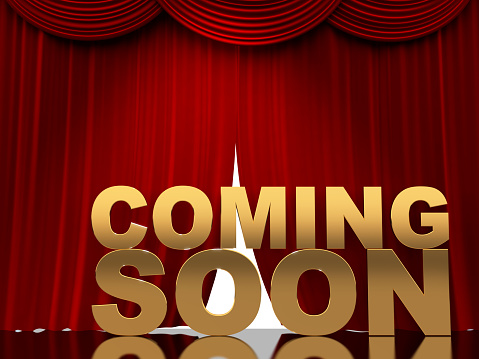 Coming Soon label on red curtain background