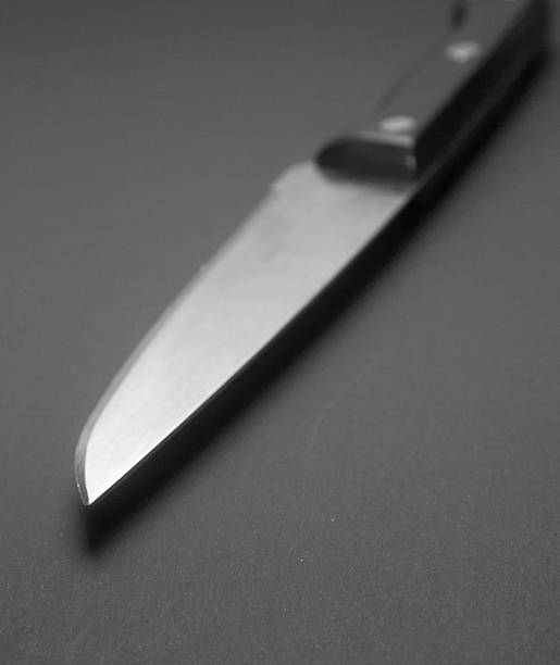 istock Stainless steel knife blade on grey 137271434