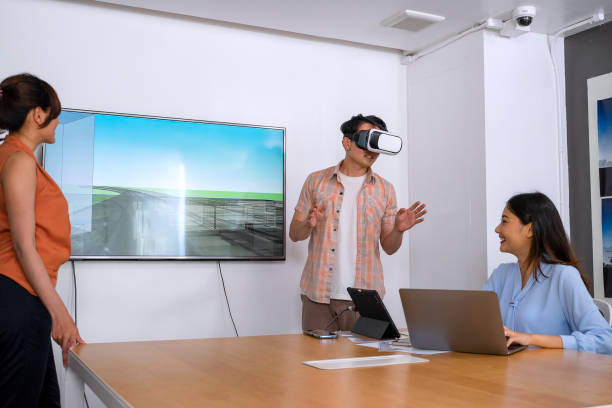 istock Employee  are working together with VR glasses. 1372714705