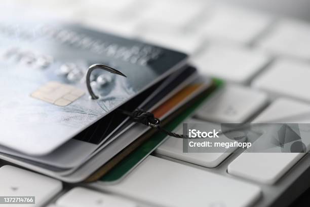 Fishing Hook With Credit Cards On Keyboard Closeup Stock Photo - Download Image Now - Phishing, Mail, Spiced Ham