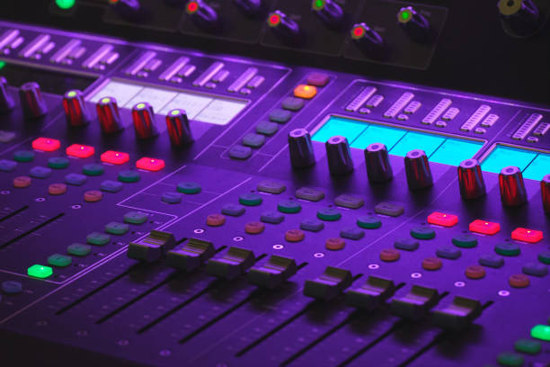 istock Modern digital mixing console with faders and control buttons 1372716405