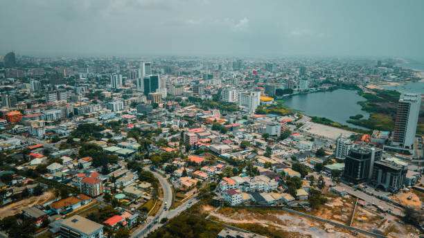 Drone view of Victoria island Lagos Nigeria Victoria Island Lagos, Nigeria - 21 Feb 2022: Drone view of major roads and traffic in Victoria Island Lagos showing the cityscape, offices and residential buildings. nigeria stock pictures, royalty-free photos & images