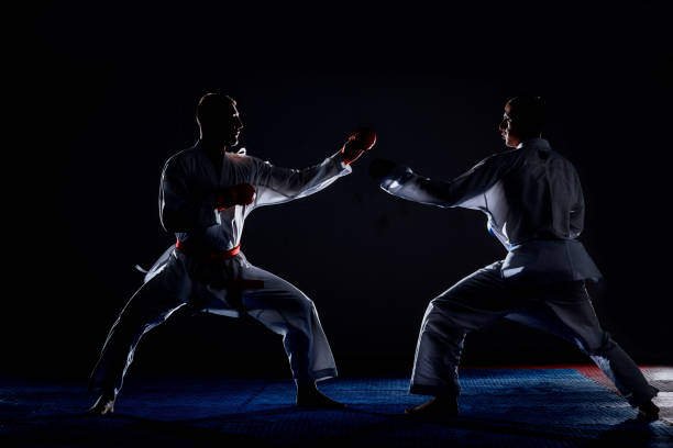 istock Judoka fighters in kimono practicing in the gym 1372723866