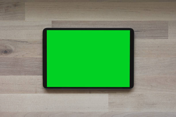istock Mobile phone with round edges, with blank green screen 1372723958