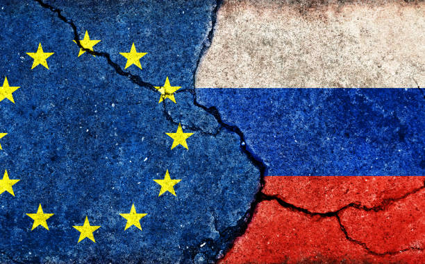 istock EU vs Russia  (War crisis , Political  conflict). Grunge country flag illustration (cracked concrete background) 1372724786