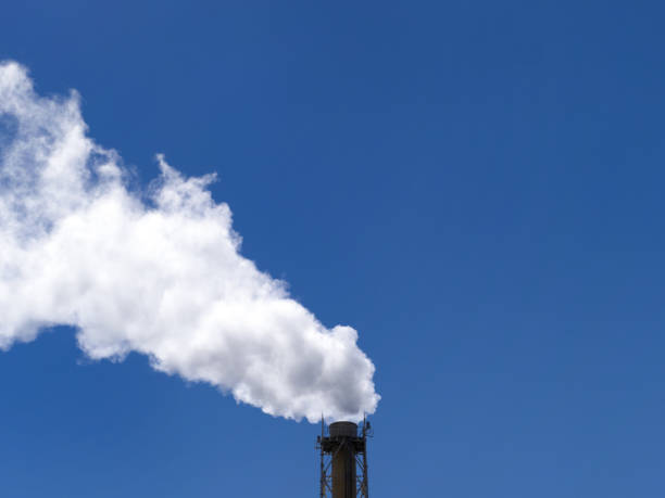 istock Factory chimney and smoke 1372725229