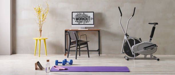 istock Sportive and training room style with purple mat dumbbell, computer background. 1372729032