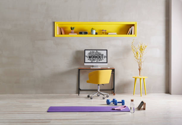 istock Sportive and training room style with purple mat dumbbell, computer background.Yellow bookshelf shelf book flower i pad laptop computer 1372729054
