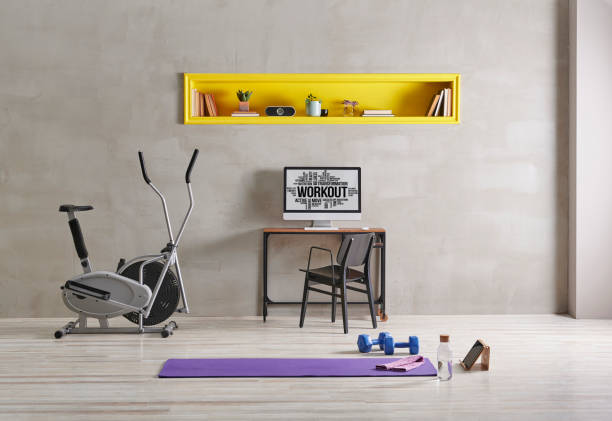 istock Sportive and training room style with purple mat dumbbell, computer background.Yellow bookshelf shelf book flower i pad laptop computer 1372729102
