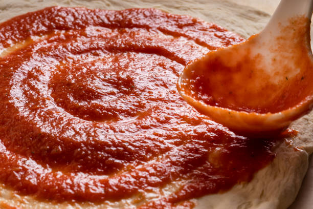 istock Raw pizza, preparation in traditional style 1372731235