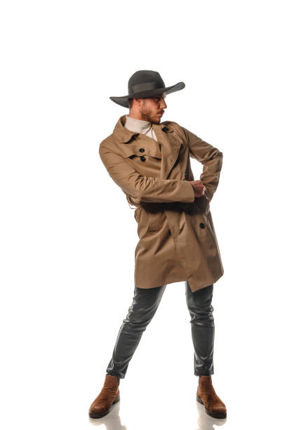 istock Modern fashion guy wearing black hat 1372732858