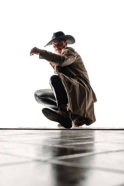 istock Attractive trendy man wearing black hat 1372733017