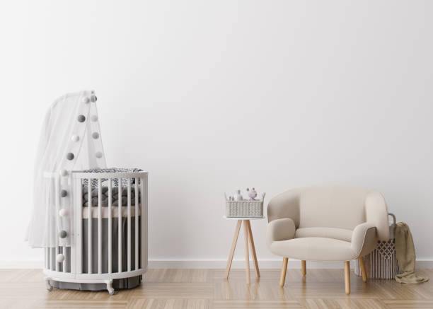 istock Empty white wall in modern child room. Mock up interior in scandinavian style. Free, copy space for your picture, poster. Baby bed, armchair. Cozy room for kids. 3D rendering. 1372738038
