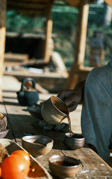 istock Pour tea with a teapot in hand 1372740678