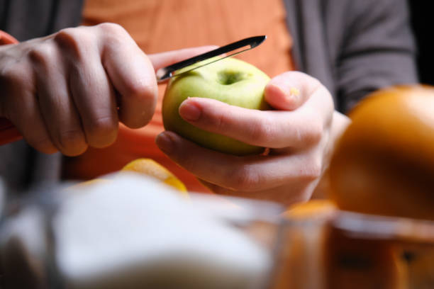 istock Preparing homemade marmalade with oranges and apples 1372742080