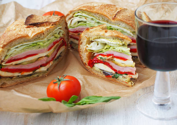 Mediterranean Pressed Picnic Sandwich with mozarella, grilled vegetables and ham