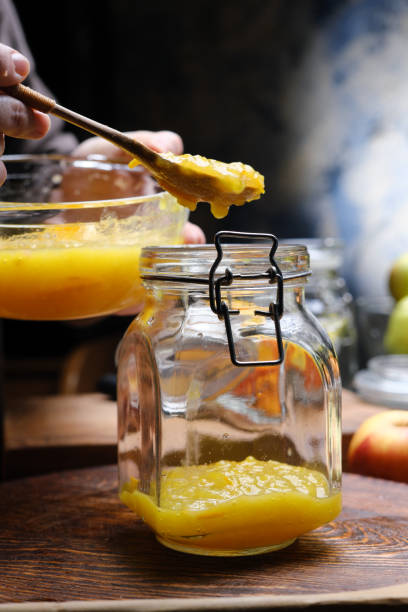 istock Preparing homemade marmalade with oranges and apples 1372742383