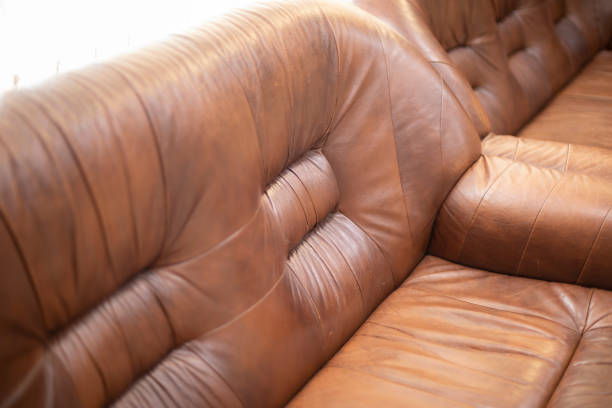 istock Leather sofa. Furniture for relaxation. Sofa is brown. Old bed. 1372746668