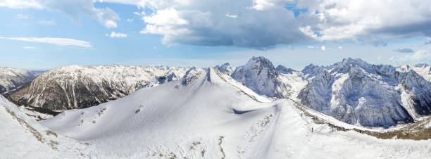 istock Mountain slope covered with snow in winter 1372748786