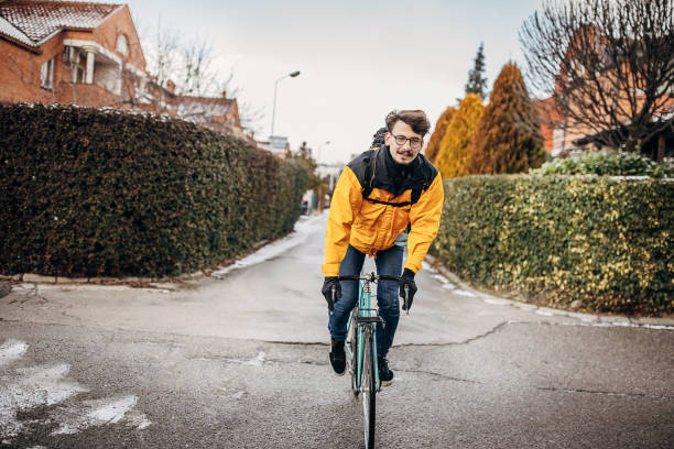 istock Man riding bicycle on the street 1372749949