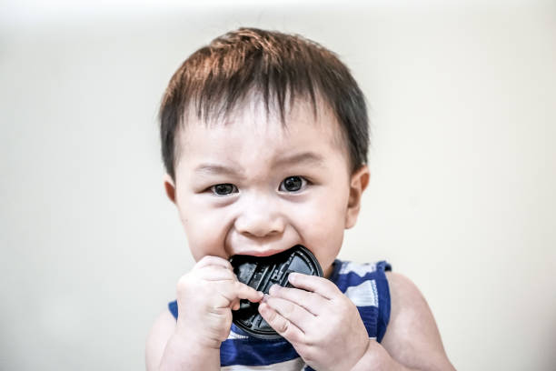 Tech perspective image of a smiling child giving a thumbs-up, expressing joy and connection.